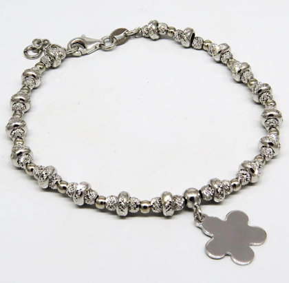 pulsera bolitas donitas facetadas con flor colgante