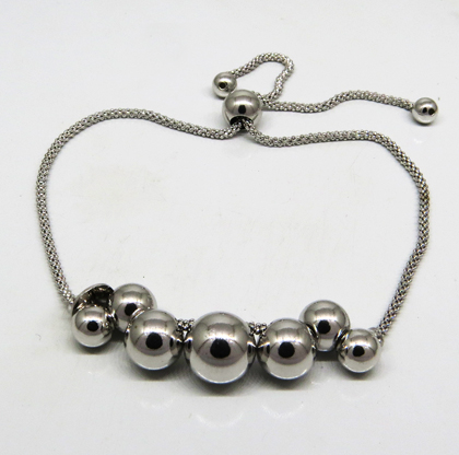 pulsera bolitas intercaladas, cierre ajustable