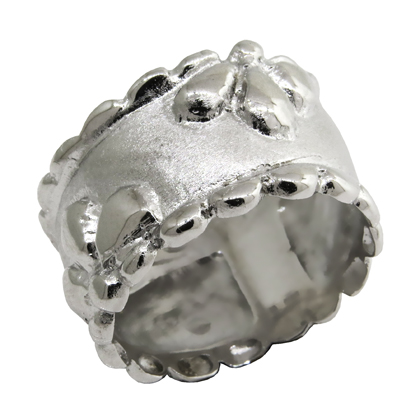 anillo dos flores con bolas en lateral, platabella