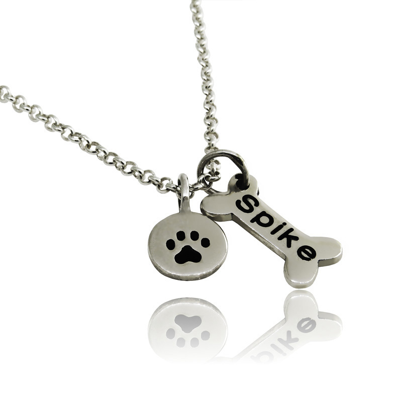Conjunto huesito y huella de perro ( 32 ups con grabado )