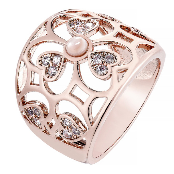 Anillo flor, ancho, calado, piedras blancas, y nacar en el centro, rosado