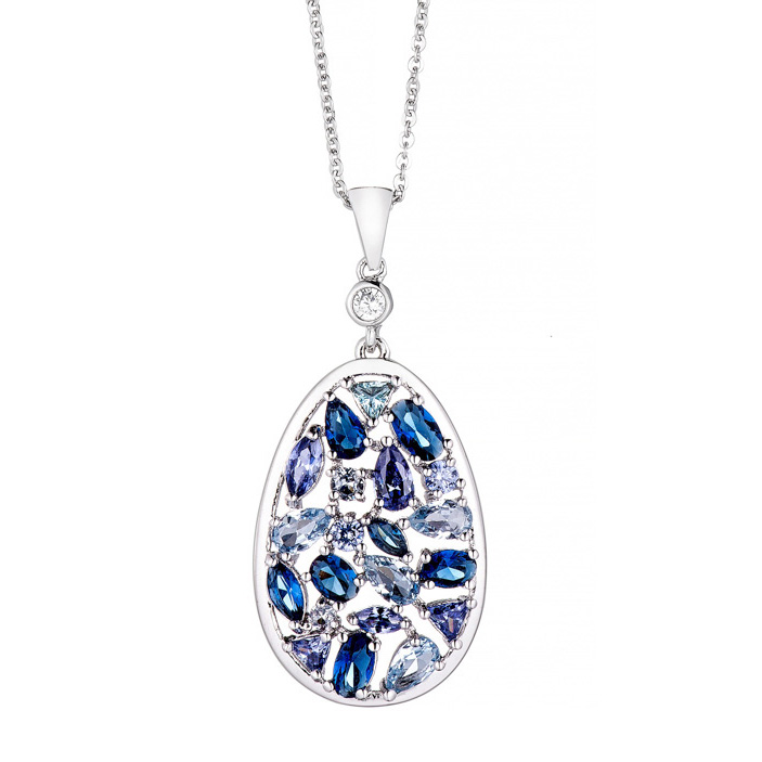 Conjunto ovalado de piedras color azul, violeta, y celeste