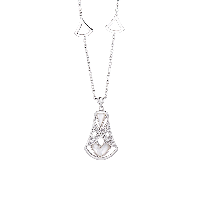 Conjunto madre perla y piedras blancas