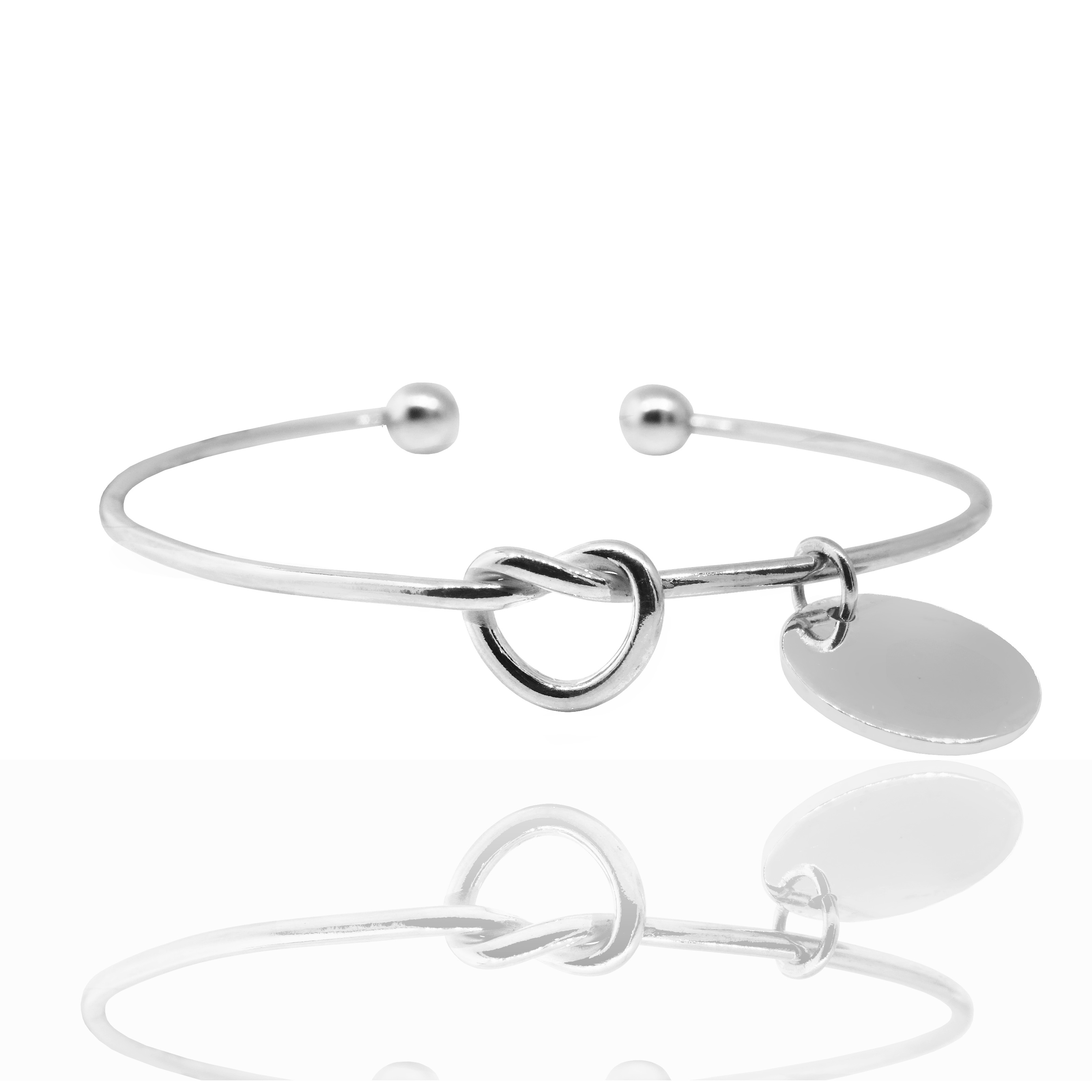 Pulsera esclava abierta, nudo, medalla, bolitas 