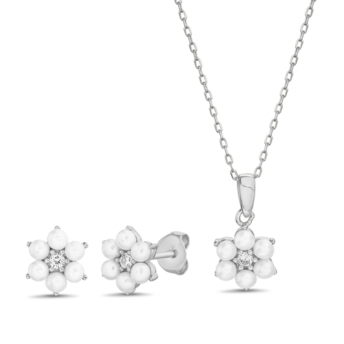 Conjunto y par de aros , flor con perlas