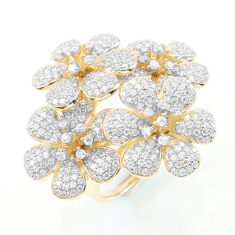 Anillo linea premium, cuatro flores, pavee, amarillo con rodio blanco