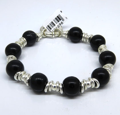 pulsera con arandelas y onix , cierre marinero