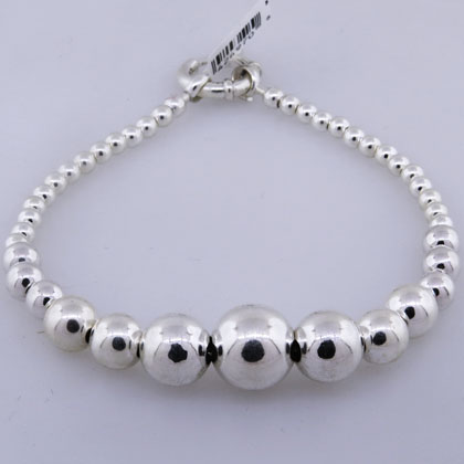 Pulsera bolitas de varios tamaños, cierre marinero