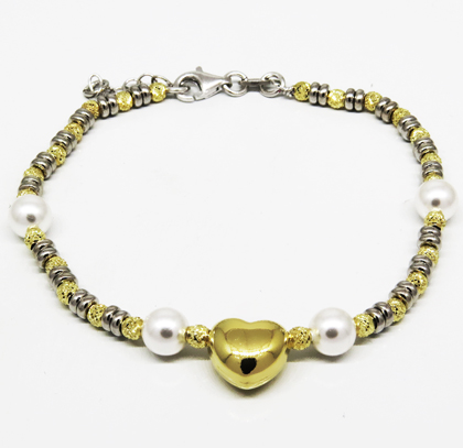 pulsera bolitas, perlas , corazon al centro, amarilla y blanca