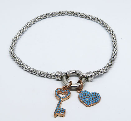 pulsera fope fina con dijes corazon y llave rosados con piedras