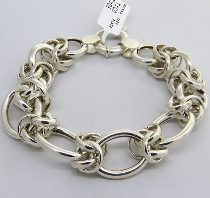 pulsera eslabones curvos entrelazados y eslabones ovalados
