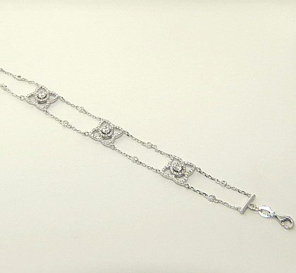pulsera doble cadenita flores con piedras blanco