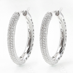 Par Aros linea premium, argollas ovaladas, de piedras blancas. Diametro interno aprox: 3,2 cm