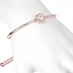 Pulsera linea premium, esclava con piedra central, ajustable, rosada.