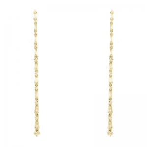 Par aros largos, piedras baguettes y redondas, tama&ntilde;o de menor a mayor, amarillos. Largo aprox 8.5 cm