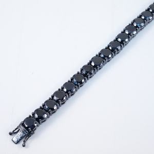 Pulsera tenis piedras negras y rodio negro. Diametro piedras prox: 8 mm