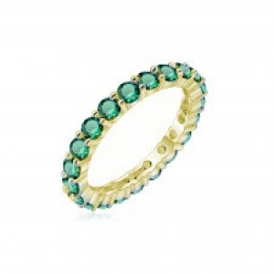 Anillo sin fin amarillo con piedras verdes