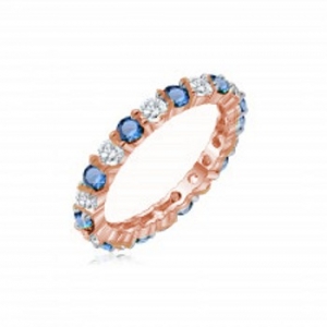 Anillo sin fin rosado con piedras azules y blancas