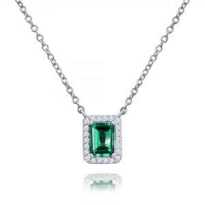 Conjunto con piedra baguette verde y blancas alrededor