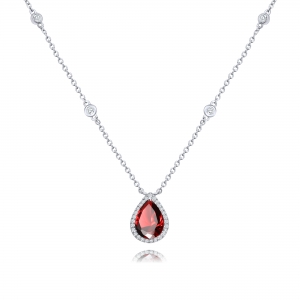Conjunto oval con piedra roja