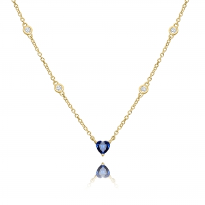 Conjunto corazon azul con piedras blancas en cadena amarilla