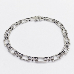 Pulsera Link1945 Rectangular plateada con piedras blancas x21