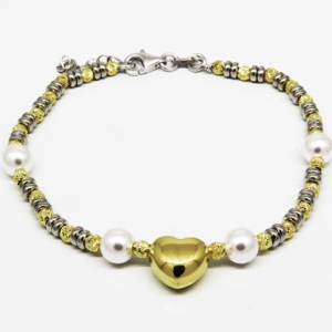 pulsera bolitas, perlas , corazon al centro, amarilla y blanca