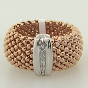 anillo fope ancho enchapado rosado con centro tira pave rodio blanco