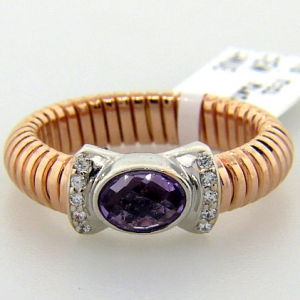 anillo resorte simple con cubic central  amatista y pave enchapado rosado