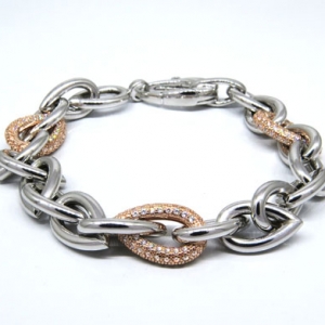 pulsera eslabonada rosada y blanca, con piedras