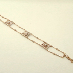pulsera doble cadenita flores con piedras rosada