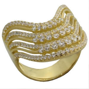 anillo alargado, ondeado, con piedras mas grandes al centro, amarillo