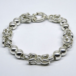 pulsera eslabones curvos entrelazados y bolitas